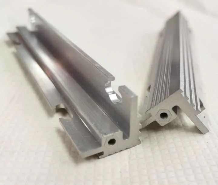 close-up of extruded aluminum profile showing smooth anodized surface