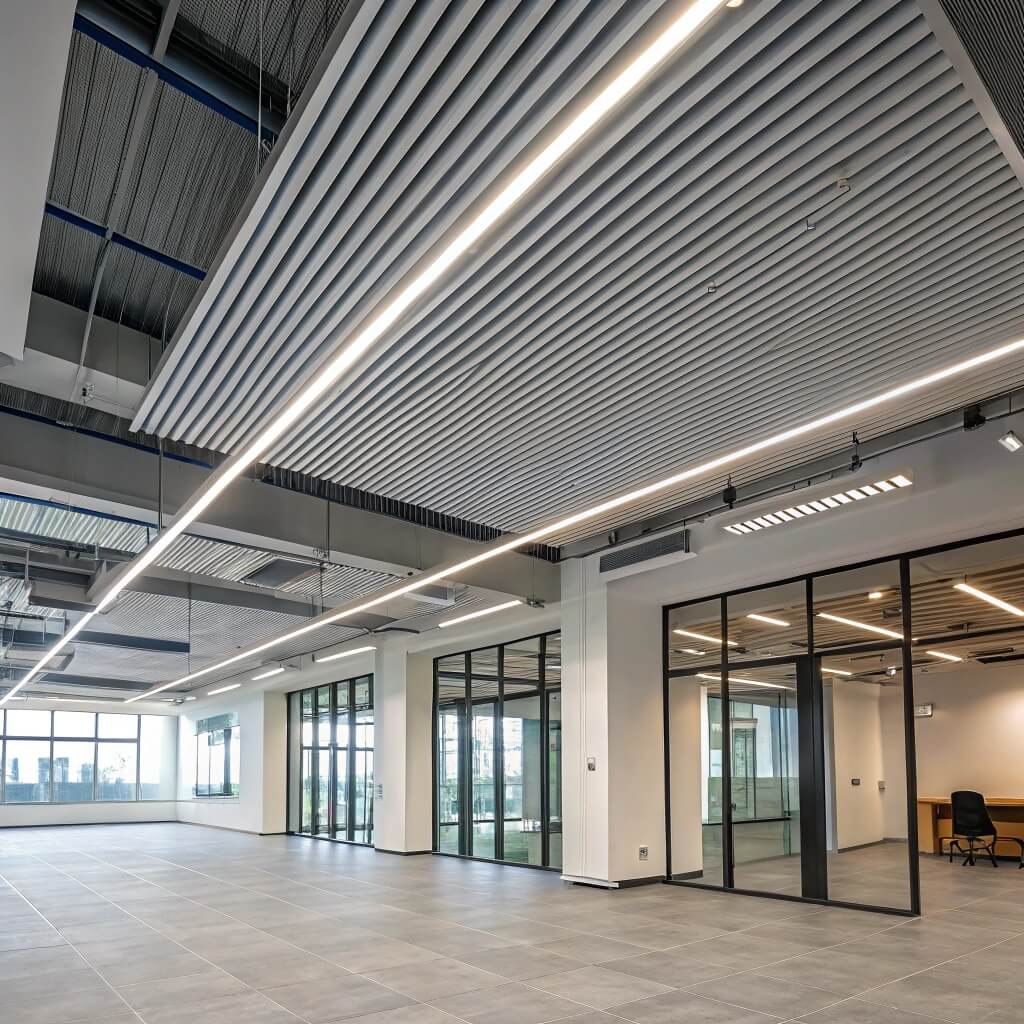 Modern office space with suspended aluminum ceiling panels